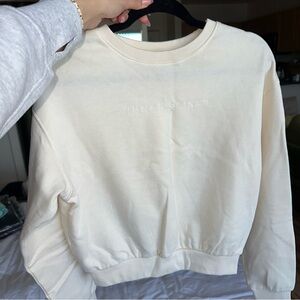 “Human Being” Cream Sweatshirt